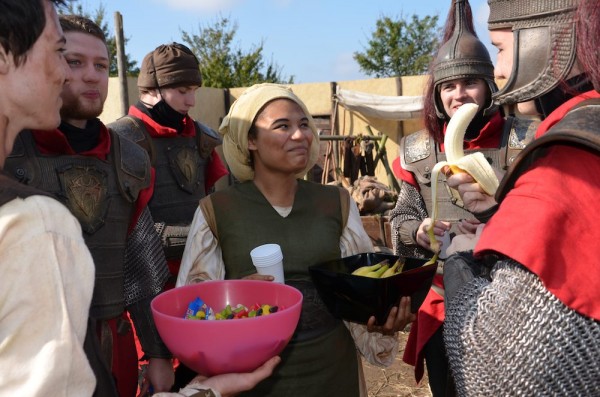 Handing out treats to the extras during a break in filming